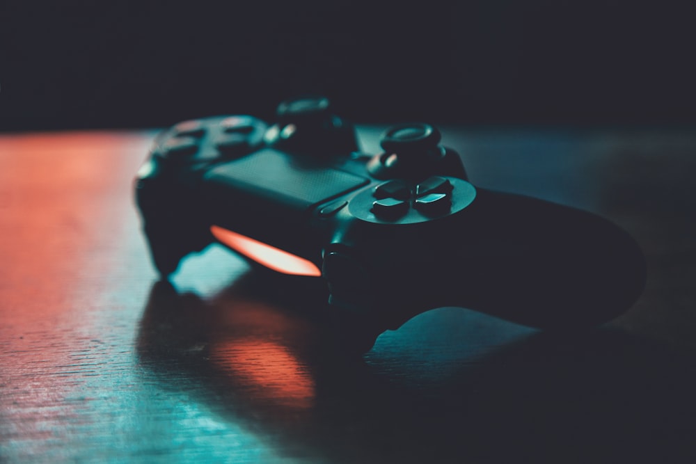 Gamer with controller in neon room